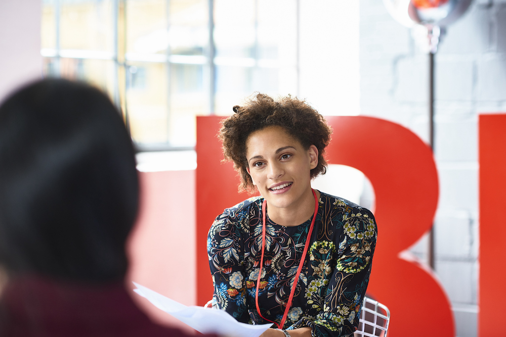 Two women having meeting in modern office