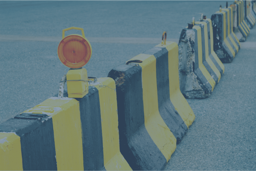 Black and yellow traffic barriers.