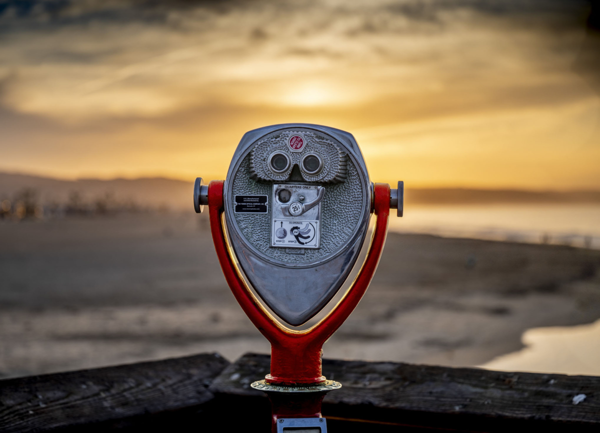The Coin-operated binoculars on blurred background. Newport Beach, California