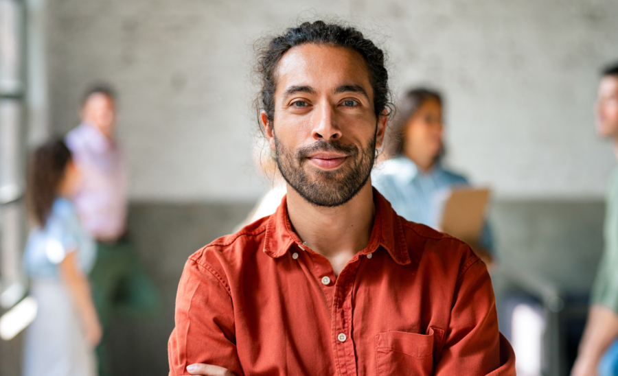 Closeup of a man wearing red shirt.