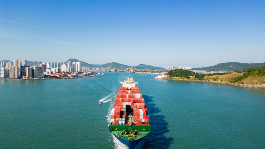 a large container ship is going through a body of water