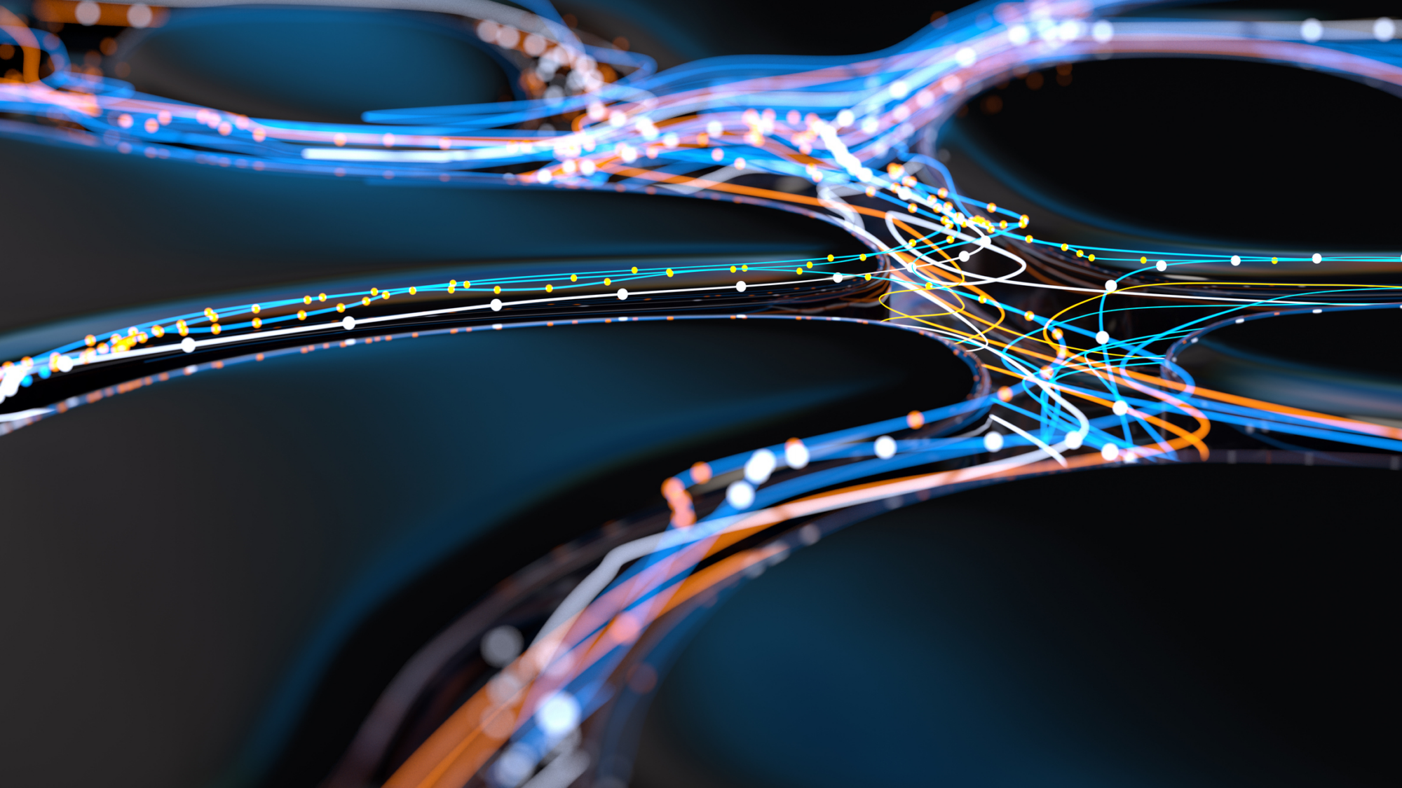 Digital representation of a network of glowing various colored fiber optic cables connecting and interweaving showing interconnections