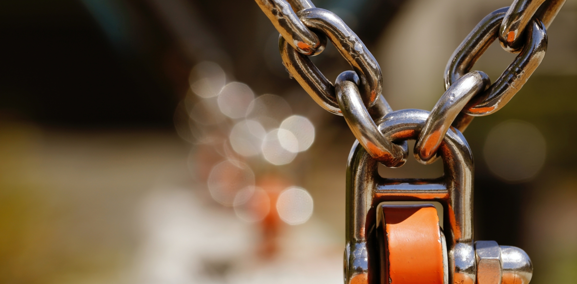 Orange lock with heavy chain